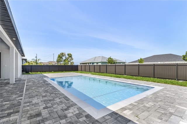 224 NW 14th Pl, Cape Coral, FL 33993 - view of swimming pool with a patio and a fenced backyard