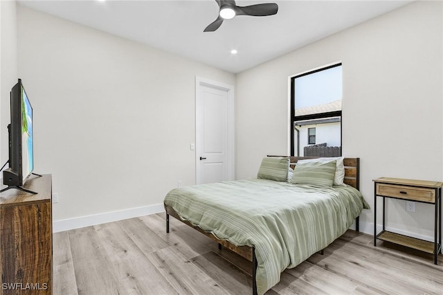 224 NW 14th Pl, Cape Coral, FL 33993 - bedroom with light wood-style flooring, baseboards, recessed lighting, and ceiling fan