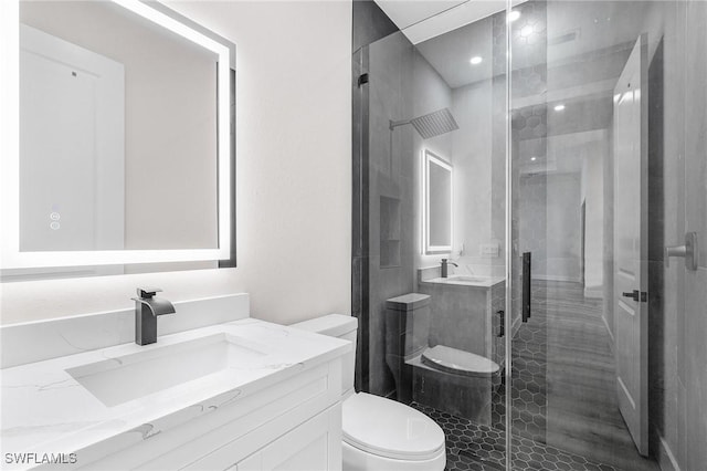 224 NW 14th Pl, Cape Coral, FL 33993 - bathroom with toilet, vanity, and a shower stall