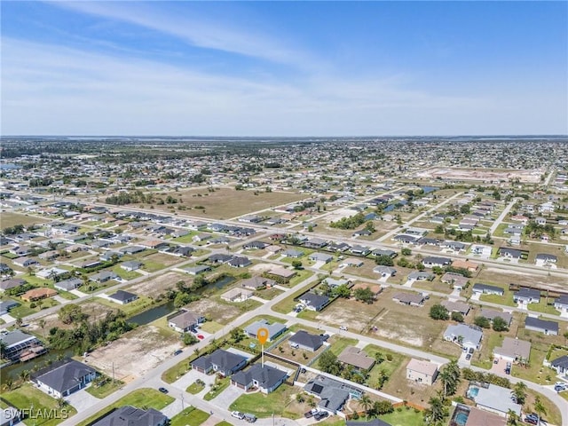 224 NW 14th Pl, Cape Coral, FL 33993 - aerial overview of property's location featuring nearby suburban area
