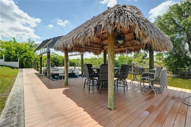 2142 NE 27th Ter, Cape Coral, FL 33909 - wooden deck with a gazebo