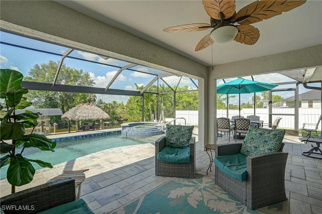 2142 NE 27th Ter, Cape Coral, FL 33909 - view of patio with a gazebo, a pool with connected hot tub, ceiling fan, and glass enclosure