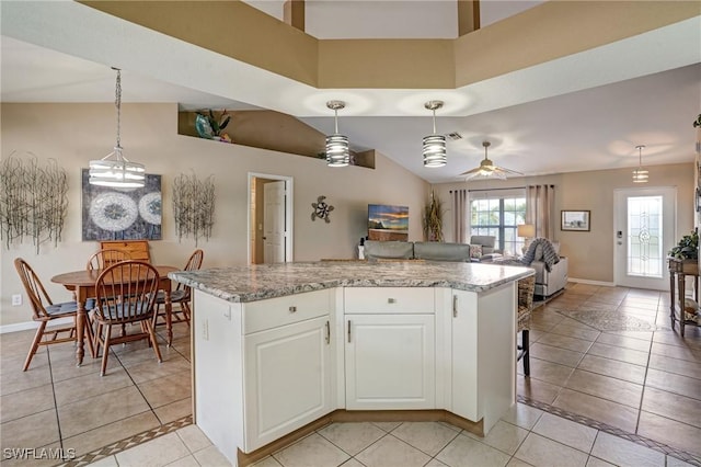 2142 NE 27th Ter, Cape Coral, FL 33909 - kitchen featuring baseboards, open floor plan, pendant lighting, and a kitchen island