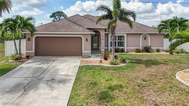 2142 NE 27th Ter, Cape Coral, FL 33909 - view of front of house with stucco siding, an attached garage, concrete driveway, and roof with shingles