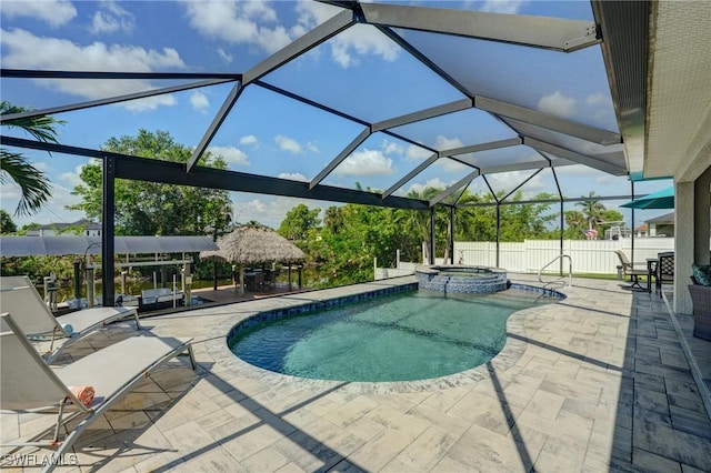 2142 NE 27th Ter, Cape Coral, FL 33909 - view of swimming pool with a patio, a pool with connected hot tub, a gazebo, and a lanai