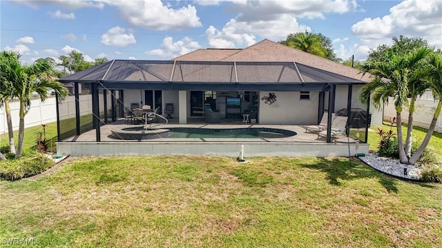2142 NE 27th Ter, Cape Coral, FL 33909 - rear view of property with a patio area, glass enclosure, and stucco siding
