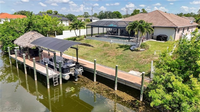 2142 NE 27th Ter, Cape Coral, FL 33909 - dock area with a water view and a lanai