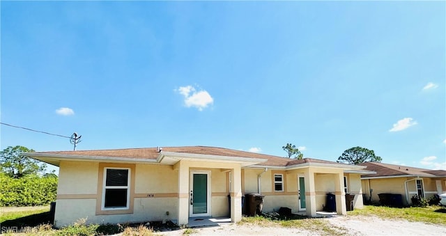 1412/1414 W 12th St, Lehigh Acres, FL 33972 - ranch-style home with stucco siding