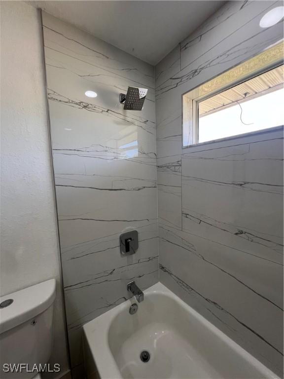1412/1414 W 12th St, Lehigh Acres, FL 33972 - full bath featuring  shower combination and toilet