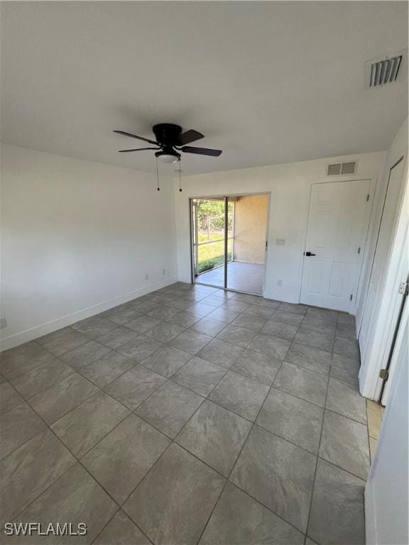 1412/1414 W 12th St, Lehigh Acres, FL 33972 - spare room with ceiling fan and baseboards