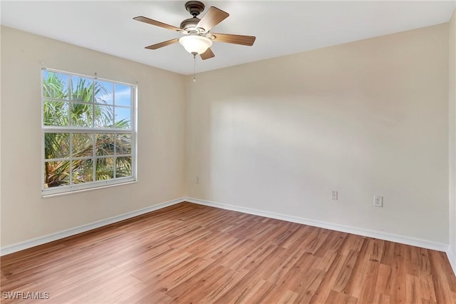 4135 Residence Dr Unit 618, Fort Myers, FL 33901 - spare room featuring light wood-style flooring, baseboards, and a ceiling fan