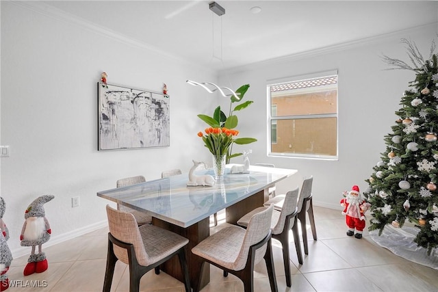 2131 Hamlin St, Naples, FL 34120 - dining space featuring light tile patterned flooring, ornamental molding, and baseboards