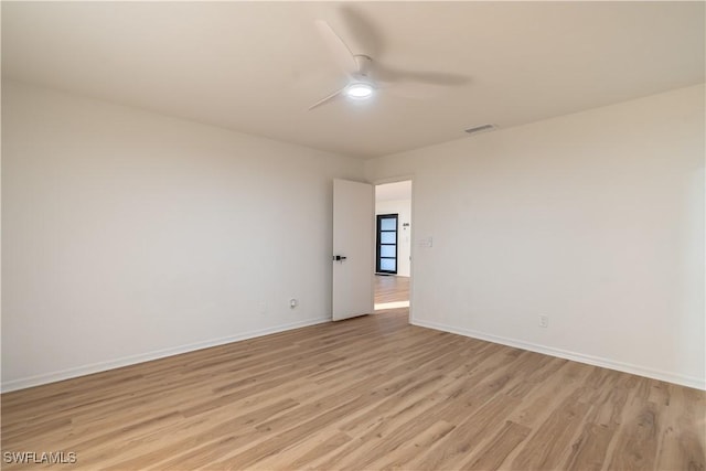 3091 52nd St SW, Naples, FL 34116 - spare room with light wood-style floors, ceiling fan, and baseboards