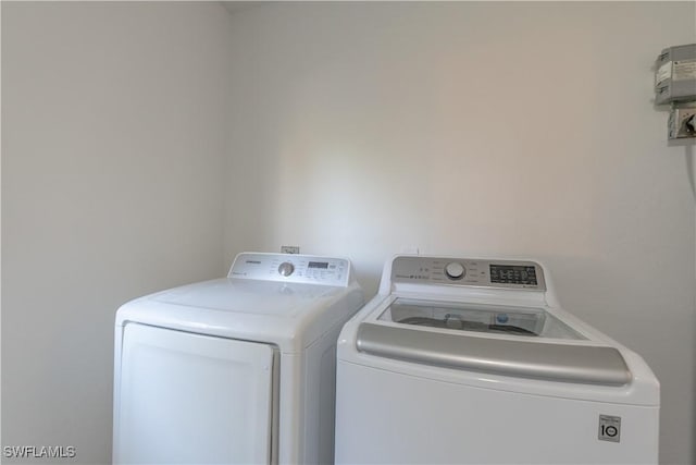 3091 52nd St SW, Naples, FL 34116 - washroom with washer and dryer