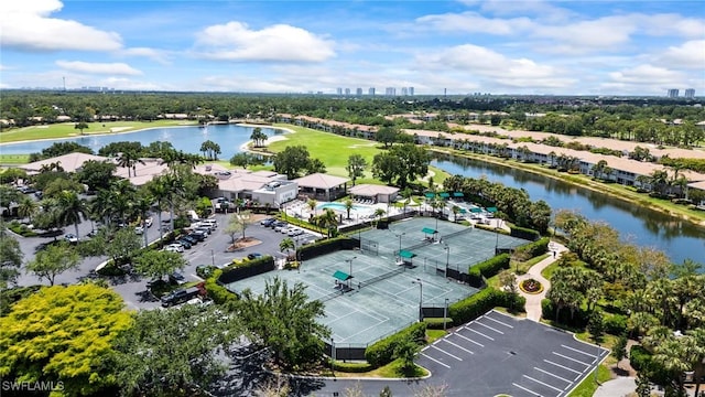 23581 Sandycreek Ter Unit 1107, Estero, FL 34135 - aerial view of a large body of water, a local golf course, and a tree filled landscape