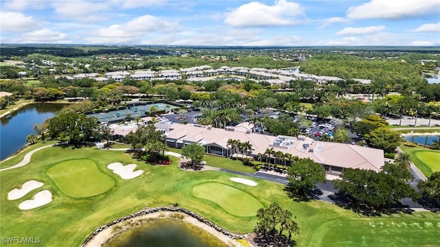 23581 Sandycreek Ter Unit 1107, Estero, FL 34135 - view of property location with a local golf course, a nearby body of water, and a tree filled landscape