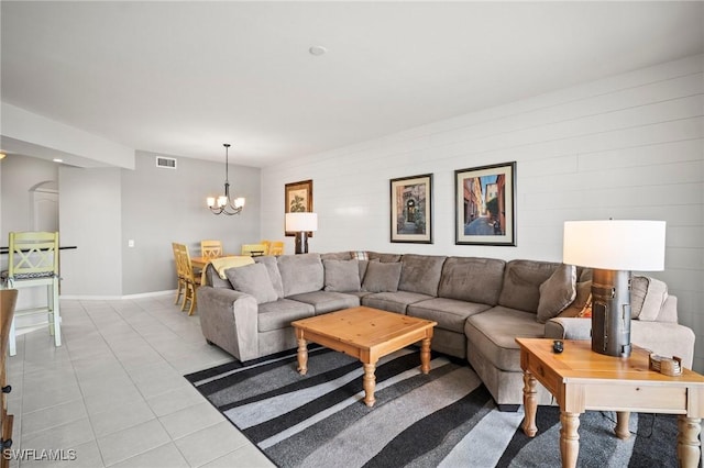 23581 Sandycreek Ter Unit 1107, Estero, FL 34135 - living area featuring a chandelier, light tile patterned flooring, and baseboards