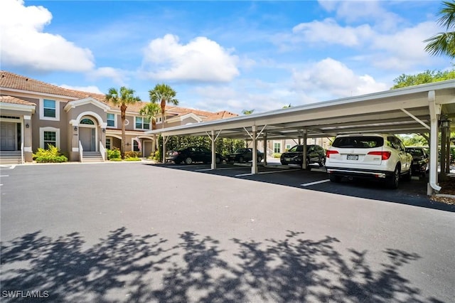23581 Sandycreek Ter Unit 1107, Estero, FL 34135 - view of covered parking lot