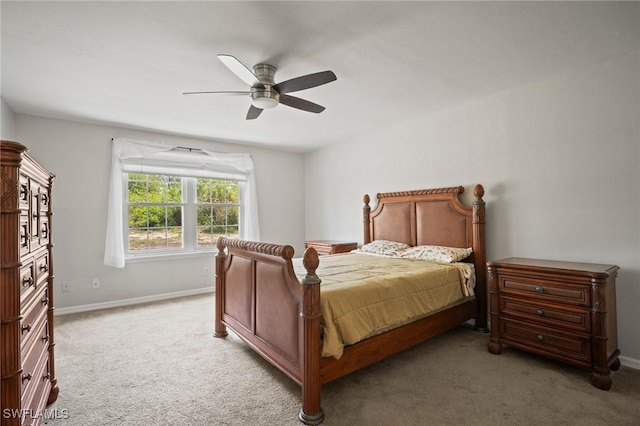 2016 Fitch Ave, Alva, FL 33920 - bedroom featuring light colored carpet, baseboards, and a ceiling fan