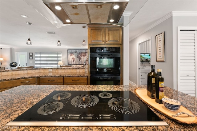 155 Donna Ct, Punta Gorda, FL 33950 - kitchen featuring black appliances, brown cabinetry, wall chimney exhaust hood, ornamental molding, and recessed lighting