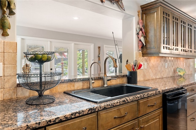 155 Donna Ct, Punta Gorda, FL 33950 - kitchen with a sink, dishwasher, decorative backsplash, and tile counters