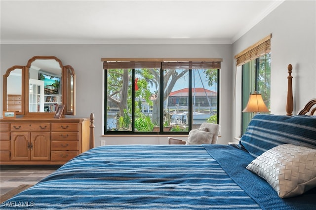155 Donna Ct, Punta Gorda, FL 33950 - bedroom featuring wood finished floors and crown molding