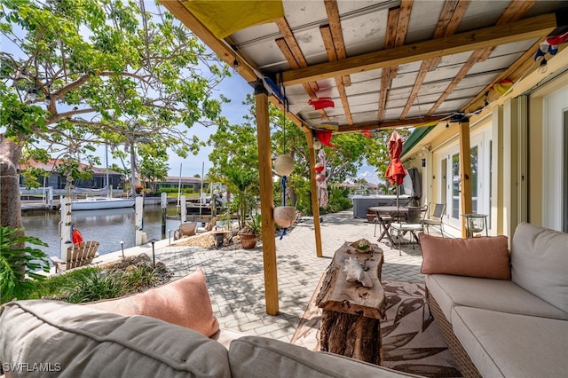 155 Donna Ct, Punta Gorda, FL 33950 - view of patio featuring a water view, an outdoor hangout area, french doors, a dock, and outdoor dining area