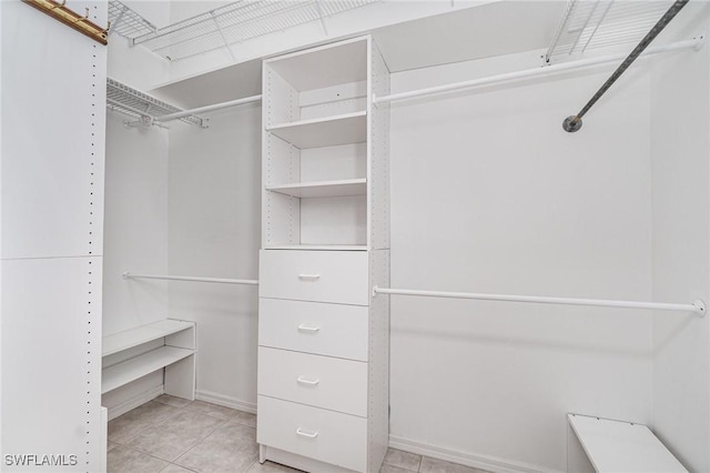 5135 Cobble Creek Ct Unit 204, Naples, FL 34110 - spacious closet with light tile patterned floors