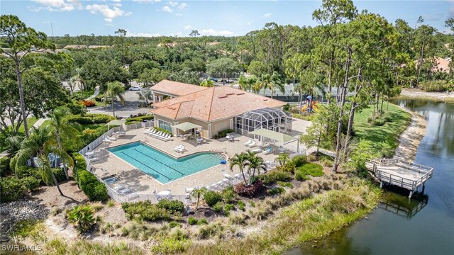 5135 Cobble Creek Ct Unit 204, Naples, FL 34110 - aerial view of property and surrounding area with a pool area and a nearby body of water