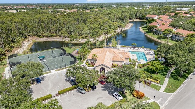 5135 Cobble Creek Ct Unit 204, Naples, FL 34110 - bird's eye view of a nearby body of water and a pool area