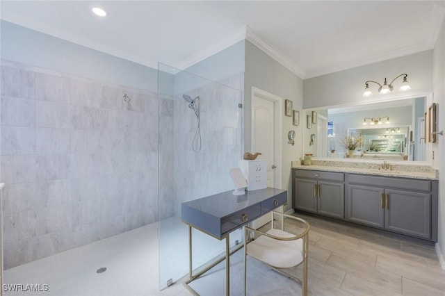 17476 Ashcomb Way, Estero, FL 33928 - full bathroom with a walk in shower, crown molding, and vanity