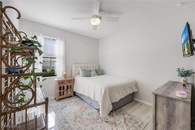 17476 Ashcomb Way, Estero, FL 33928 - bedroom with wood finished floors and ceiling fan