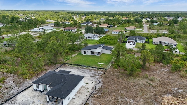 2815 45th St W, Lehigh Acres, FL 33971 - aerial view of property and surrounding area featuring nearby suburban area