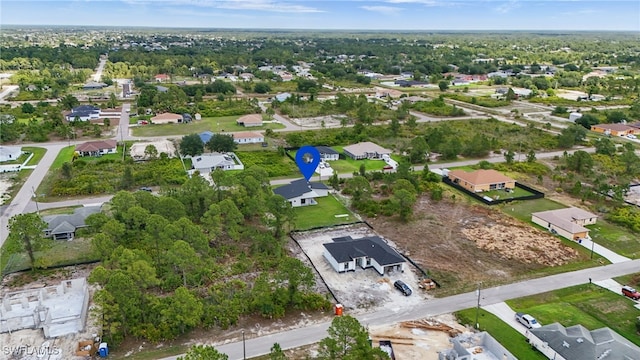 2815 45th St W, Lehigh Acres, FL 33971 - aerial overview of property's location with nearby suburban area