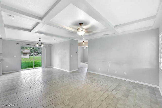 13820 2nd St, Fort Myers, FL 33905 - unfurnished room with coffered ceiling, a ceiling fan, baseboards, beamed ceiling, and a chandelier