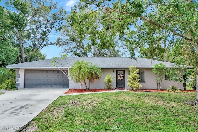 13820 2nd St, Fort Myers, FL 33905 - single story home featuring an attached garage, stucco siding, concrete driveway, and a front yard