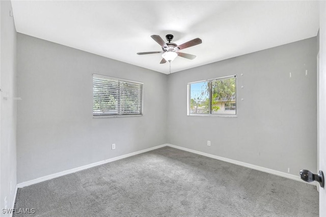 13820 2nd St, Fort Myers, FL 33905 - empty room featuring plenty of natural light, a ceiling fan, carpet, and baseboards
