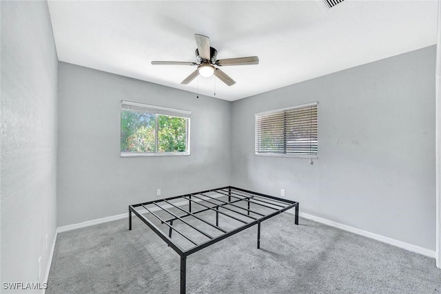 13820 2nd St, Fort Myers, FL 33905 - empty room featuring a ceiling fan, carpet floors, and baseboards