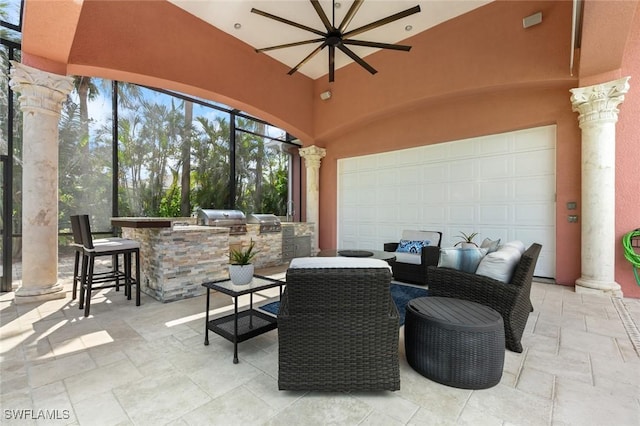 4409 Crews Ct, Port Charlotte, FL 33952 - view of patio / terrace with a garage and exterior bar
