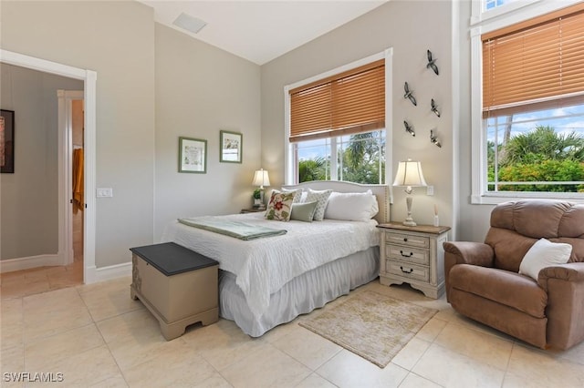 4409 Crews Ct, Port Charlotte, FL 33952 - bedroom featuring light tile patterned flooring and baseboards