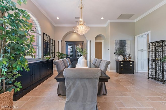 4409 Crews Ct, Port Charlotte, FL 33952 - dining room featuring arched walkways, ornate columns, ornamental molding, stone tile floors, and recessed lighting