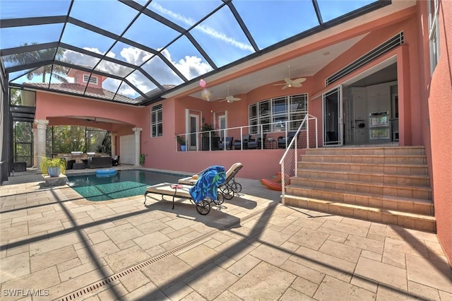4409 Crews Ct, Port Charlotte, FL 33952 - outdoor pool featuring ceiling fan, a patio, an outdoor hangout area, and glass enclosure