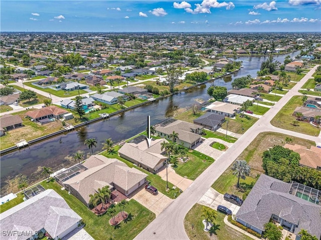 1826 SE 6th Ave, Cape Coral, FL 33990 - aerial overview of property's location with nearby suburban area and a large body of water