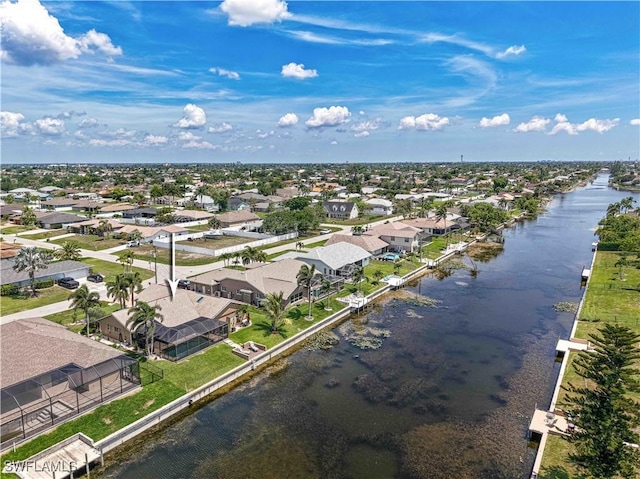 1826 SE 6th Ave, Cape Coral, FL 33990 - aerial perspective of suburban area with a large body of water