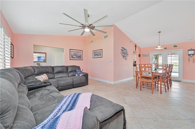 1826 SE 6th Ave, Cape Coral, FL 33990 - living room with a ceiling fan, light tile patterned floors, baseboards, french doors, and high vaulted ceiling