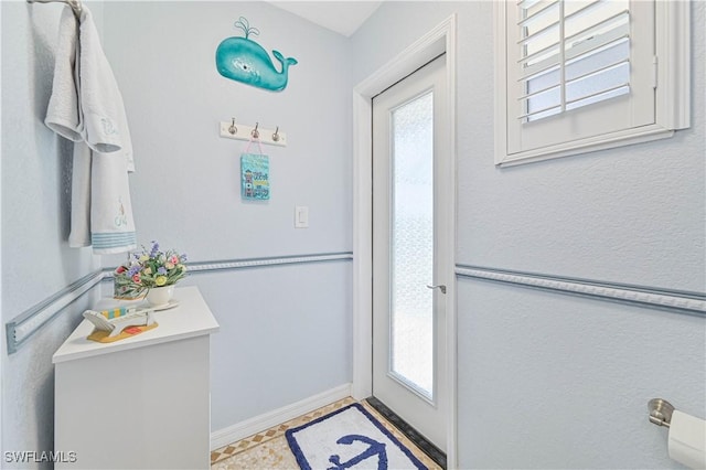 1826 SE 6th Ave, Cape Coral, FL 33990 - entryway with baseboards