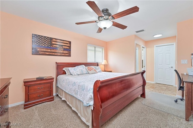 1826 SE 6th Ave, Cape Coral, FL 33990 - bedroom featuring light colored carpet, baseboards, and a ceiling fan