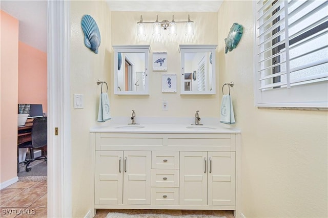 1826 SE 6th Ave, Cape Coral, FL 33990 - full bath featuring double vanity and tile patterned flooring