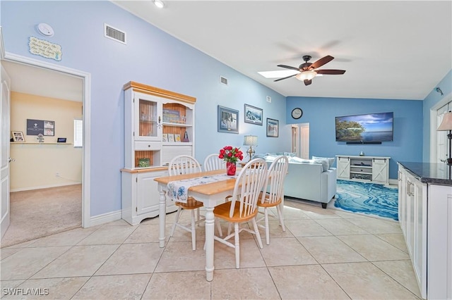 1826 SE 6th Ave, Cape Coral, FL 33990 - dining room featuring a ceiling fan, light tile patterned floors, baseboards, and lofted ceiling