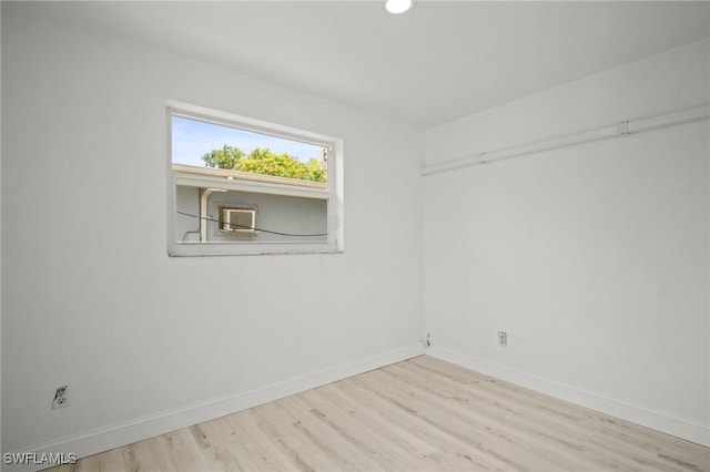 2316 Bayside St, Naples, FL 34112 - empty room featuring wood finished floors, baseboards, and recessed lighting